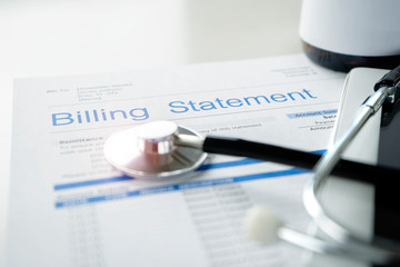 stethoscope and billing statement
